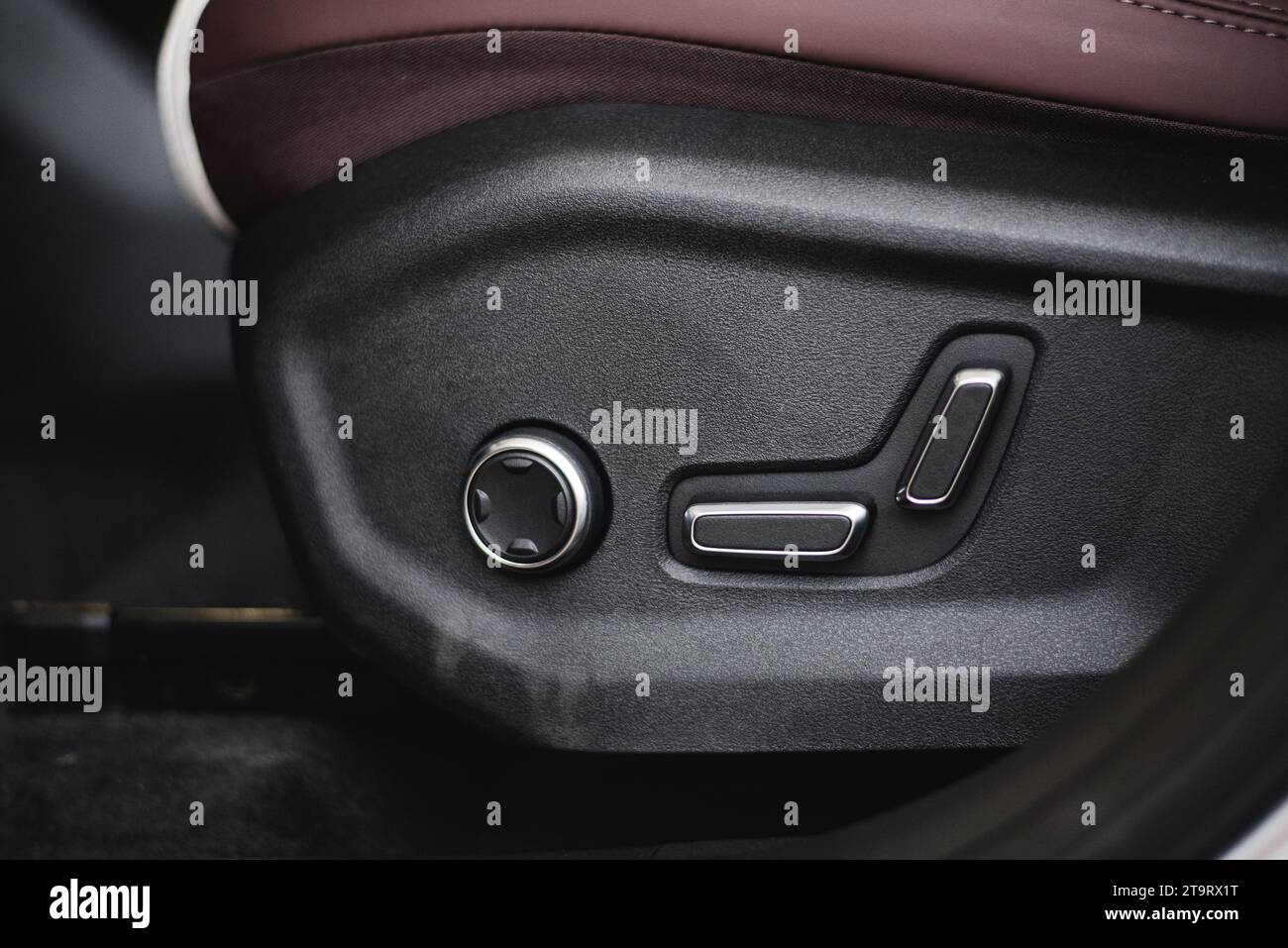 Mechanical levers at side of driver's seat for adjusting position