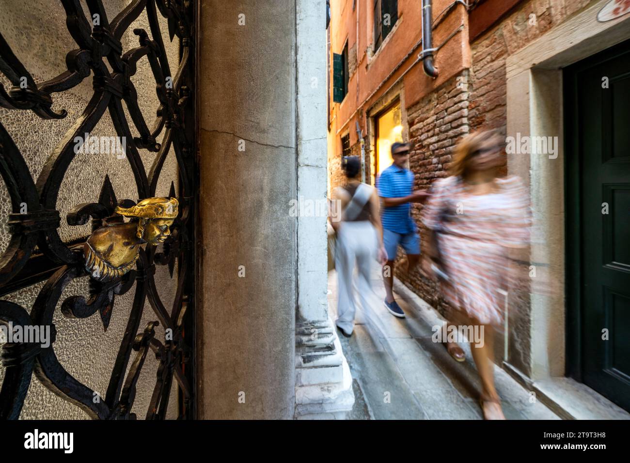 On a narrow alleyway in Venice, Italy Stock Photo