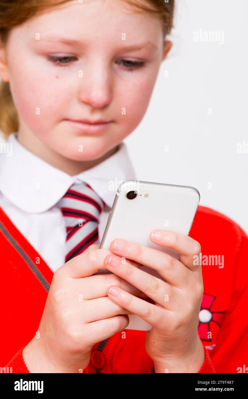 Year 5 school girl child aged 9 years / year old kid in school uniform