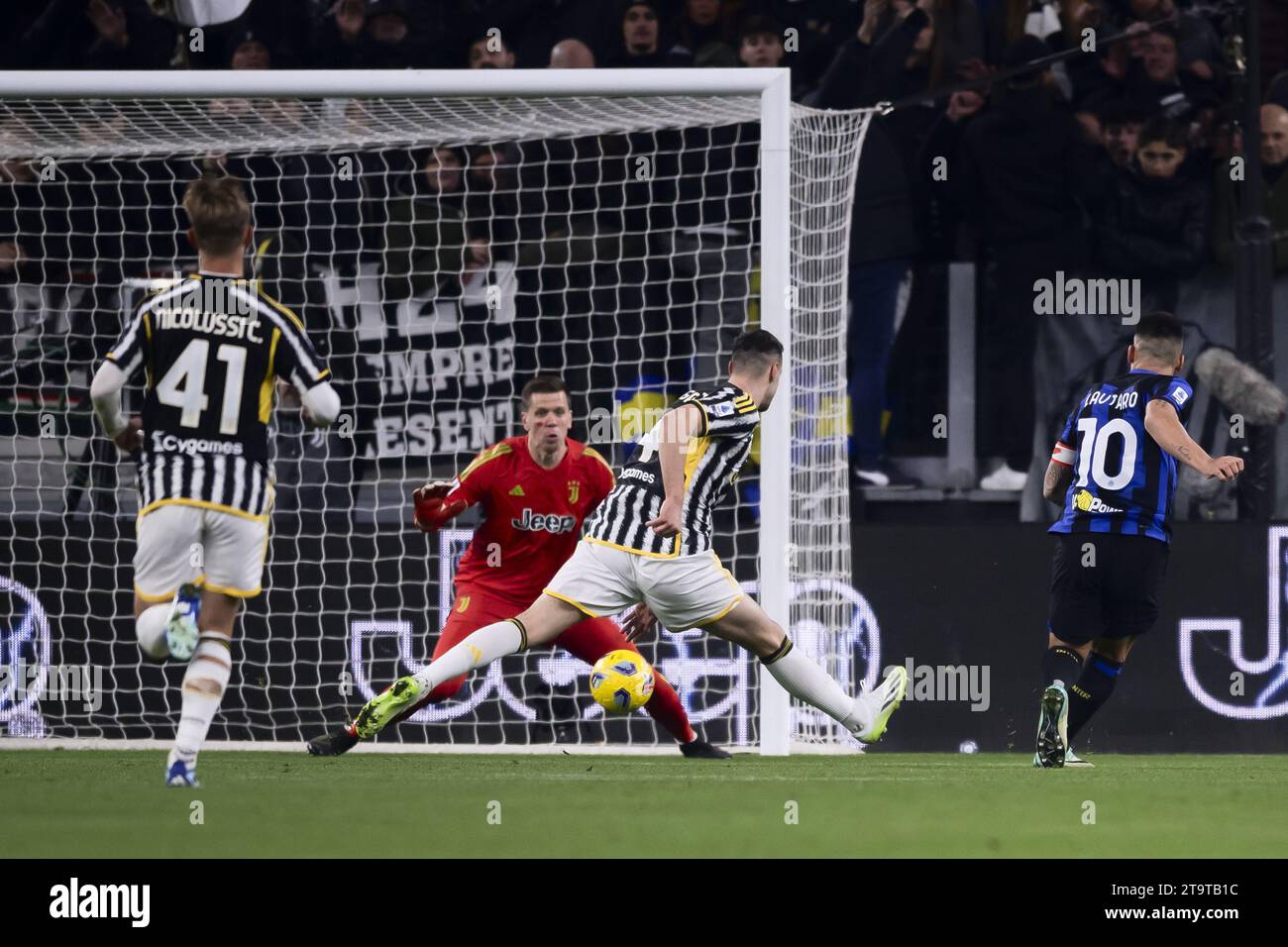 Turin, Italy. 26th Nov, 2023. FC Inter's Lautaro Martinez (1st R) scores during the Serie A football match between FC Juventus and FC Inter in Turin, Italy, Nov. 26, 2023. Credit: Federico Tardito/Xinhua/Alamy Live News Stock Photo