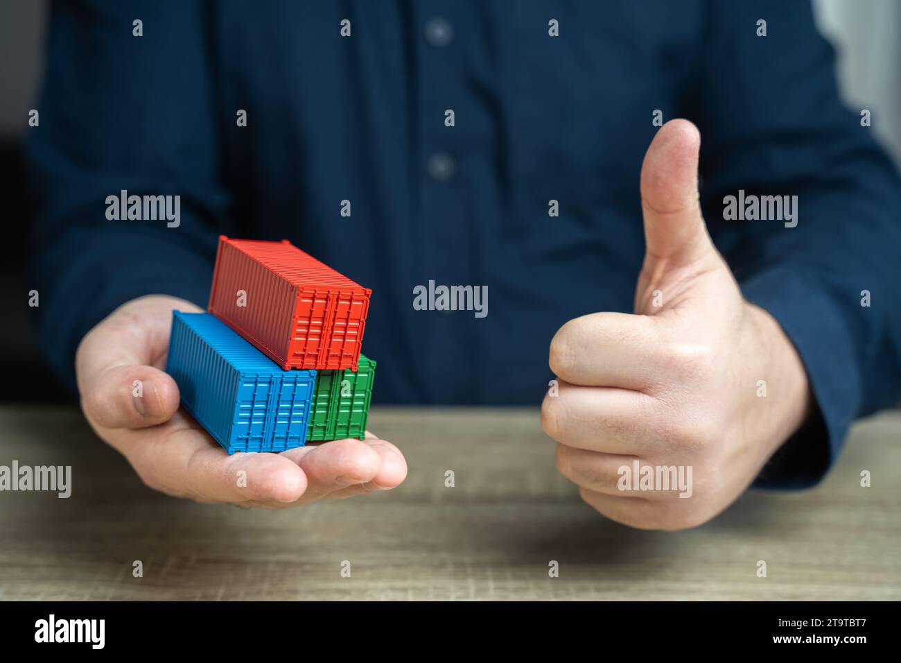 Shipping containers and a thumbs up gesture seal of approval. Conclude ...