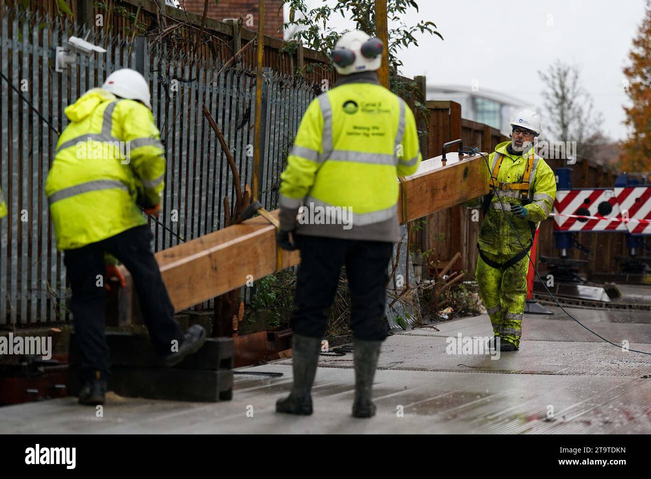 Canal and River Trust workers at the Meadow Lane Lock on the Nottingham