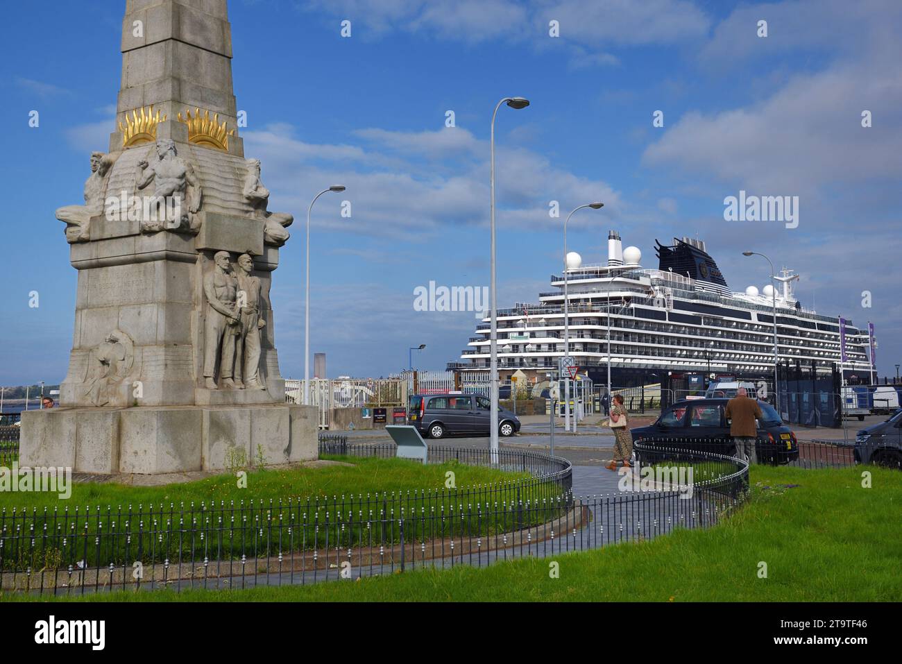 MSC Explora 1 Cruise Ship or Luxury Cruiser Moored on the Waterfront, Port or Pier Head Liverpool UK & Titanic Memorial or Monument Stock Photo