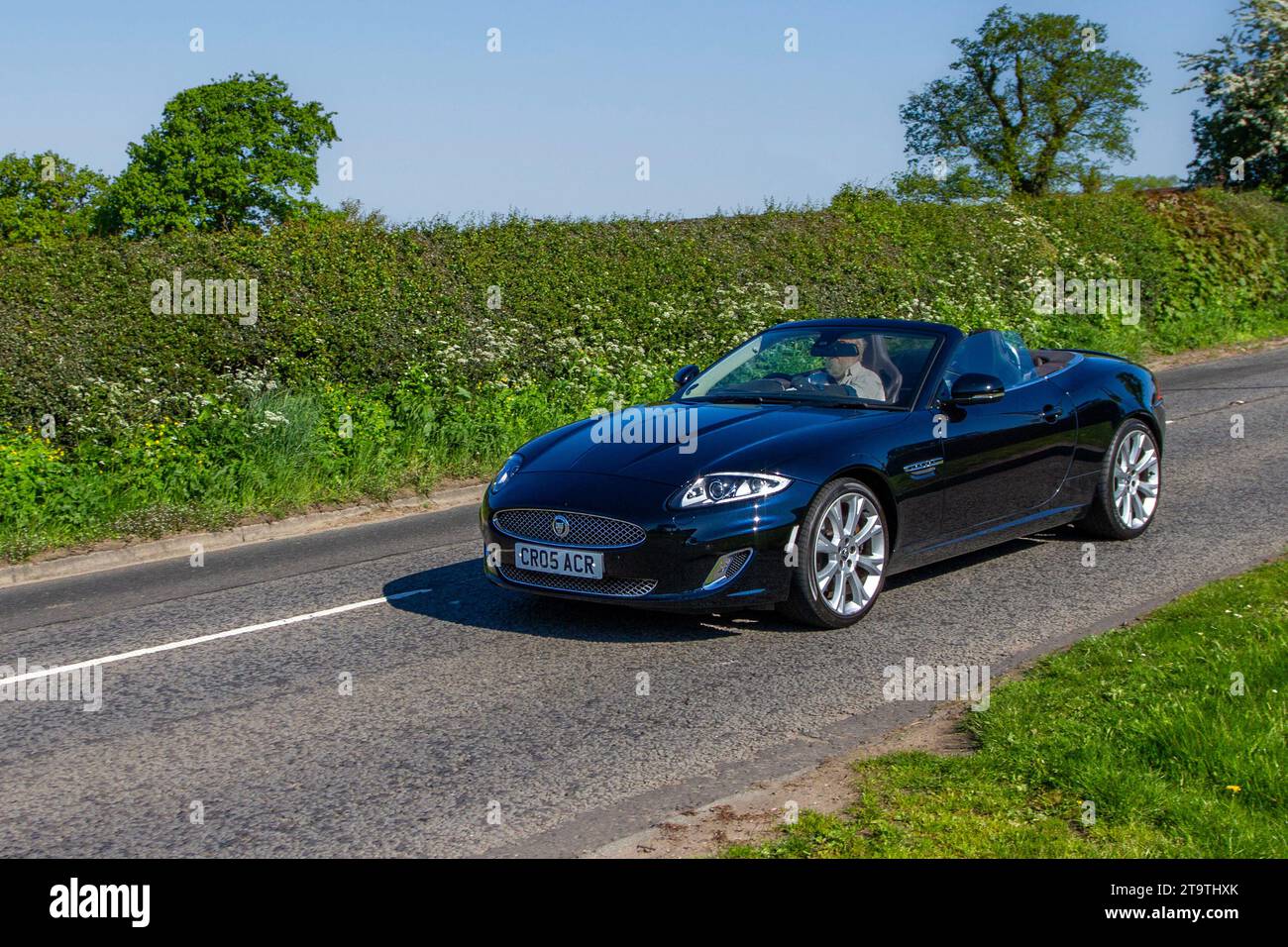 2013 Black Jaguar Artisan Special Edition, XK Base Project 7 5000 cc petrol roadster, 2+2 grand tourer;  sports and performance car enthusiasts travelling in Cheshire, UK Stock Photo