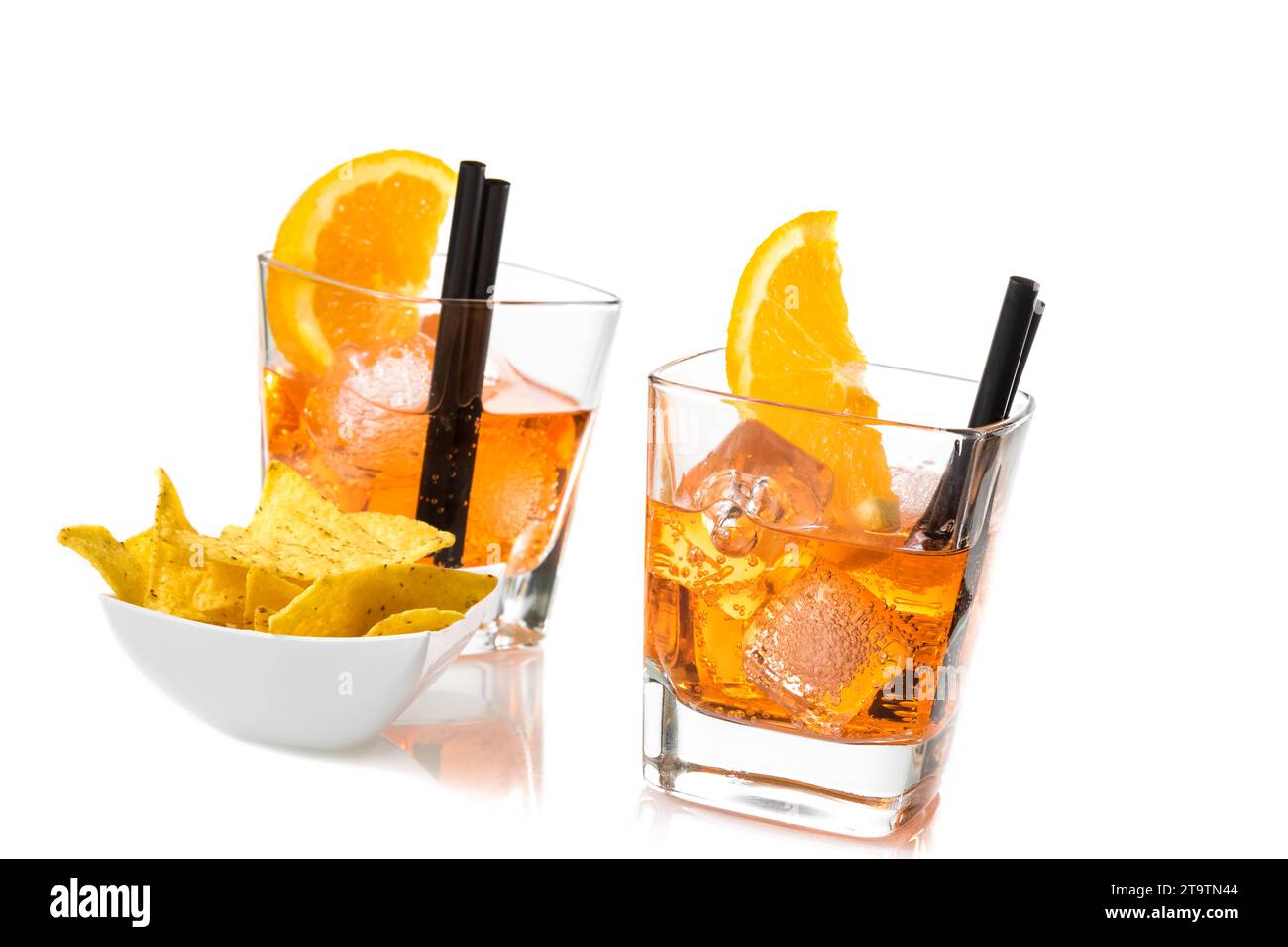 two glasses of spritz aperitif aperol cocktail with orange slices and ...