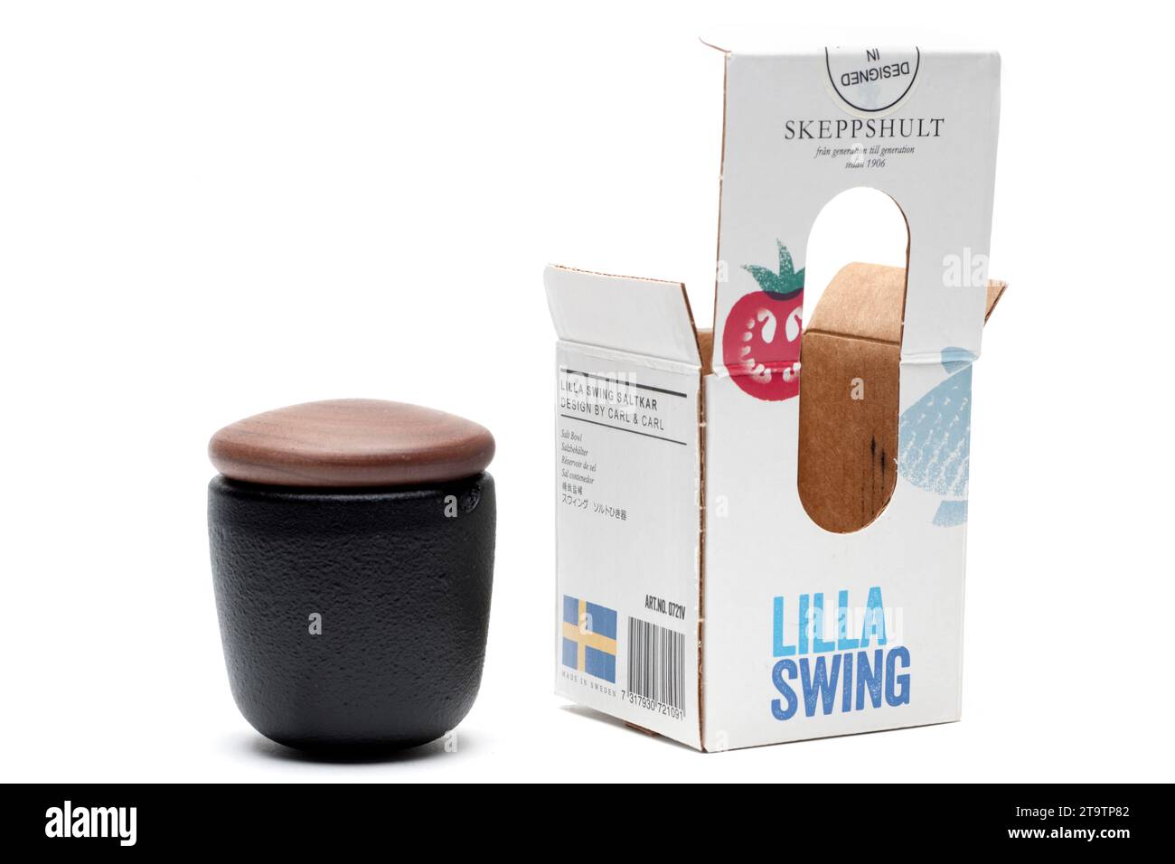 SKEPPSHULT LILLA SWING CAST IRON SALT POT with BOX and WALNUT LID on a WHITE BACKGROUND Stock Photo