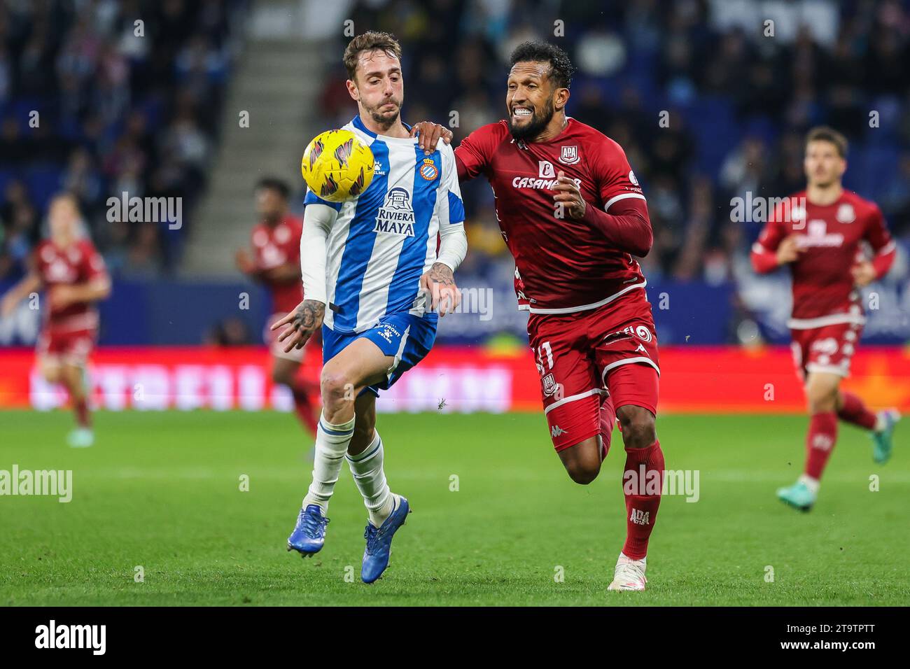 Barcelona, Spain. 26th Nov, 2023. Dyego Sousa (11) of Alcorcon and Fernando Calero (5) of Espanyol seen during the LaLiga 2 match between Espanyol v Alcorcon at the Stage Front Stadium in Barcelona. (Photo Credit: Gonzales Photo/Alamy Live News Stock Photo