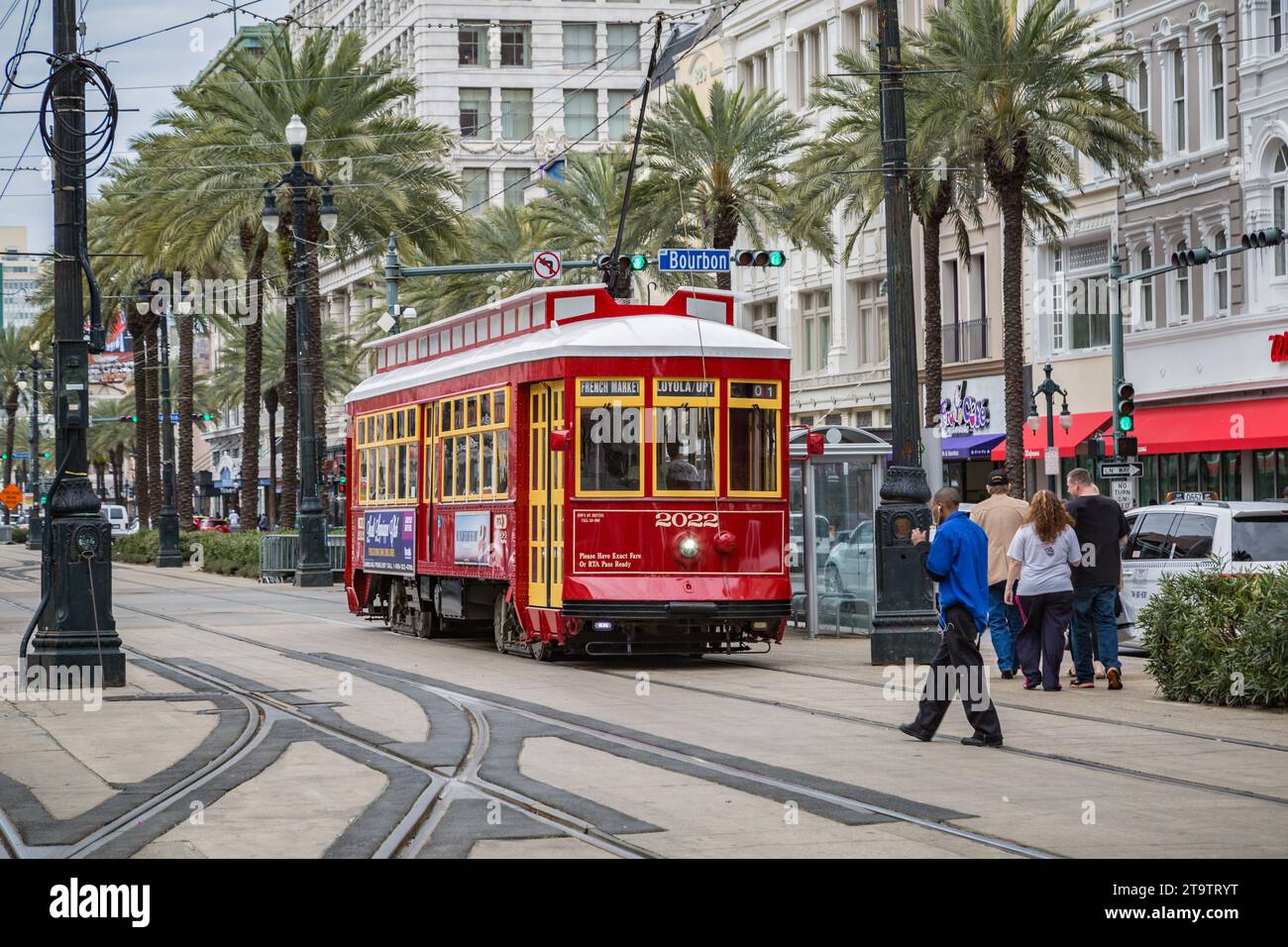 Streetcar on Canal Street at Bourbon Street in downtown New Orleans, Louisiana Stock Photo