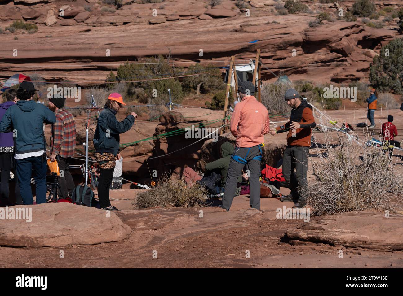 Participants in the GGBY World Highlining Festival practice yo-yoing when not walking the highlines.  Moab, Utah. Stock Photo