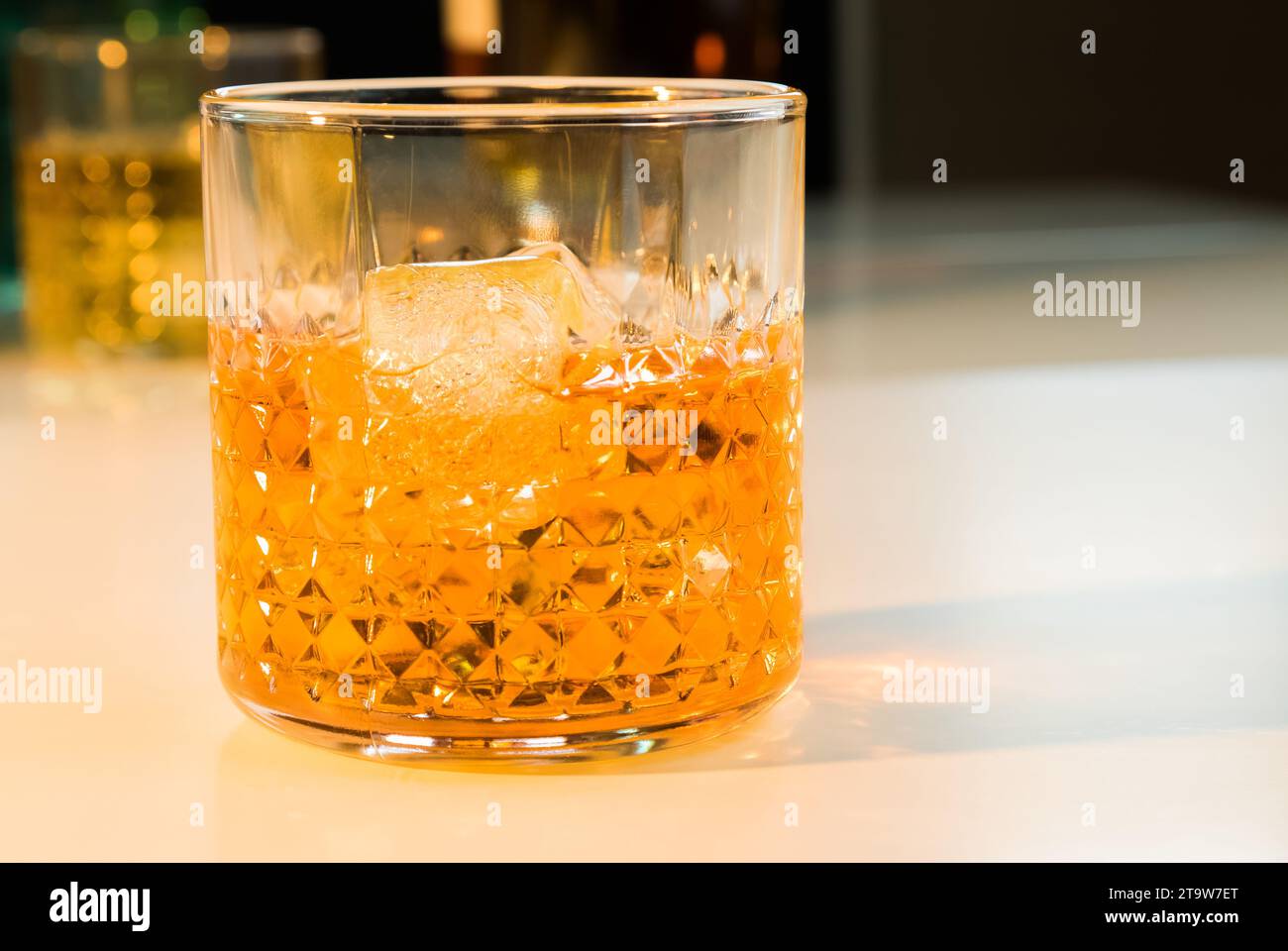 Whiskey With Ice Cubes In Glass Stock Photo, Picture and Royalty Free  Image. Image 12197629.