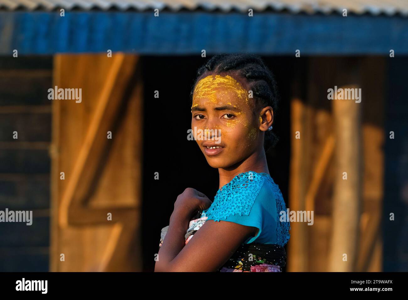 Malagasy girl with sun protection mask made from Musiro root at Begidro near Ankiliroroka, Belo sur Tsiribihina, Menabe, Central Highlands, Madagascar Stock Photo