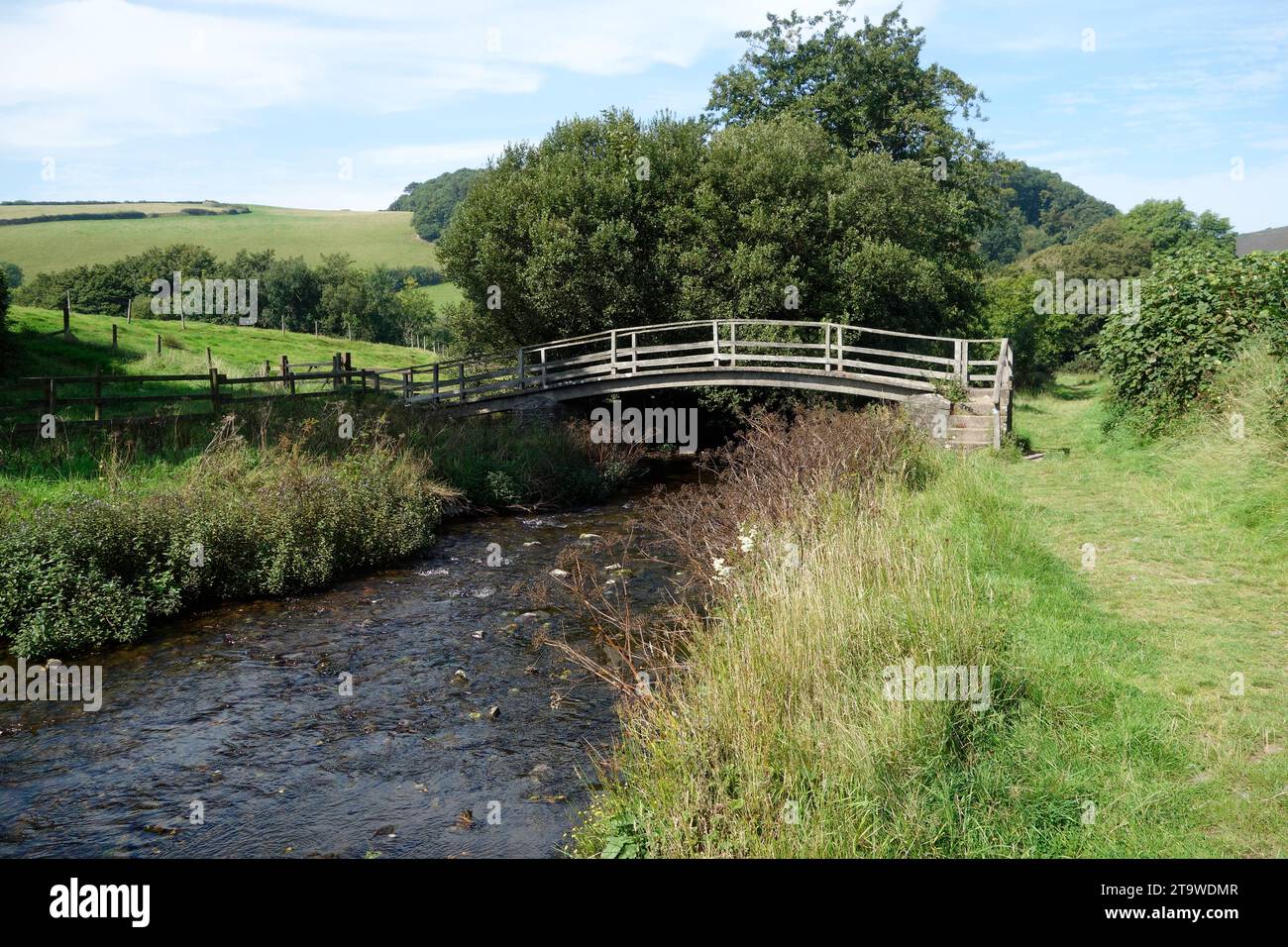 Footbridge Over Oare Water, Nr Malmsmead, Exmoor National Park, Somerset, England, UK in September Stock Photo