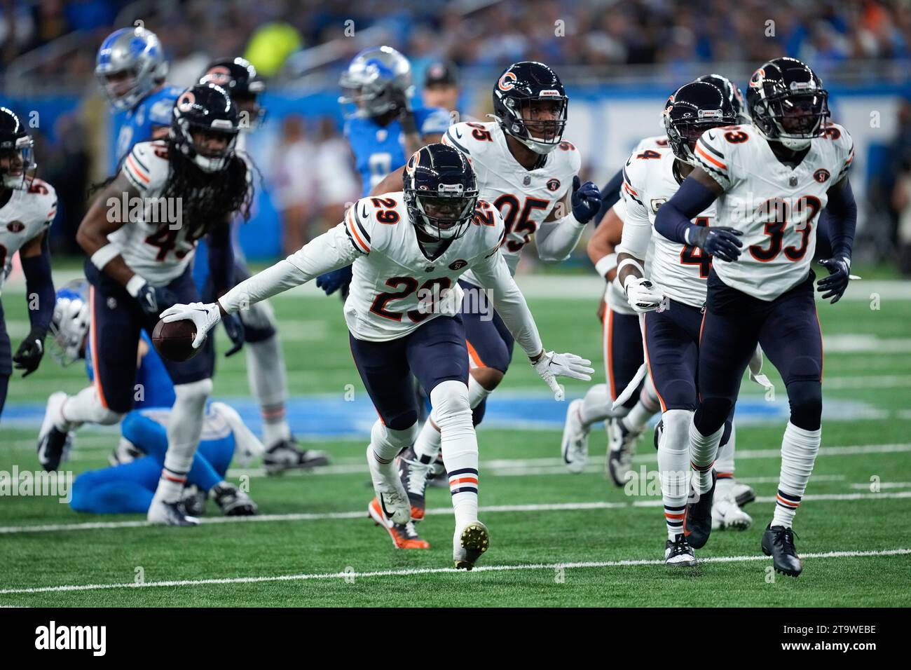 Chicago Bears cornerback Tyrique Stevenson (29) celebrates intercepting