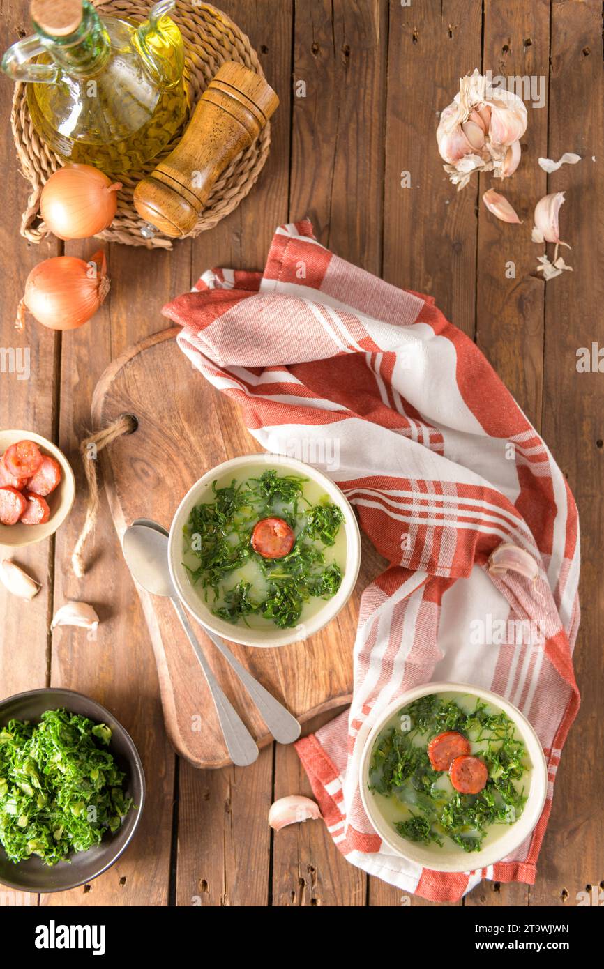 https://c8.alamy.com/comp/2T9WJWN/caldo-verde-popular-soup-in-portuguese-cuisine-traditional-ingredients-for-caldo-verde-are-potatoes-collard-greens-olive-oil-and-salt-additionall-2T9WJWN.jpg