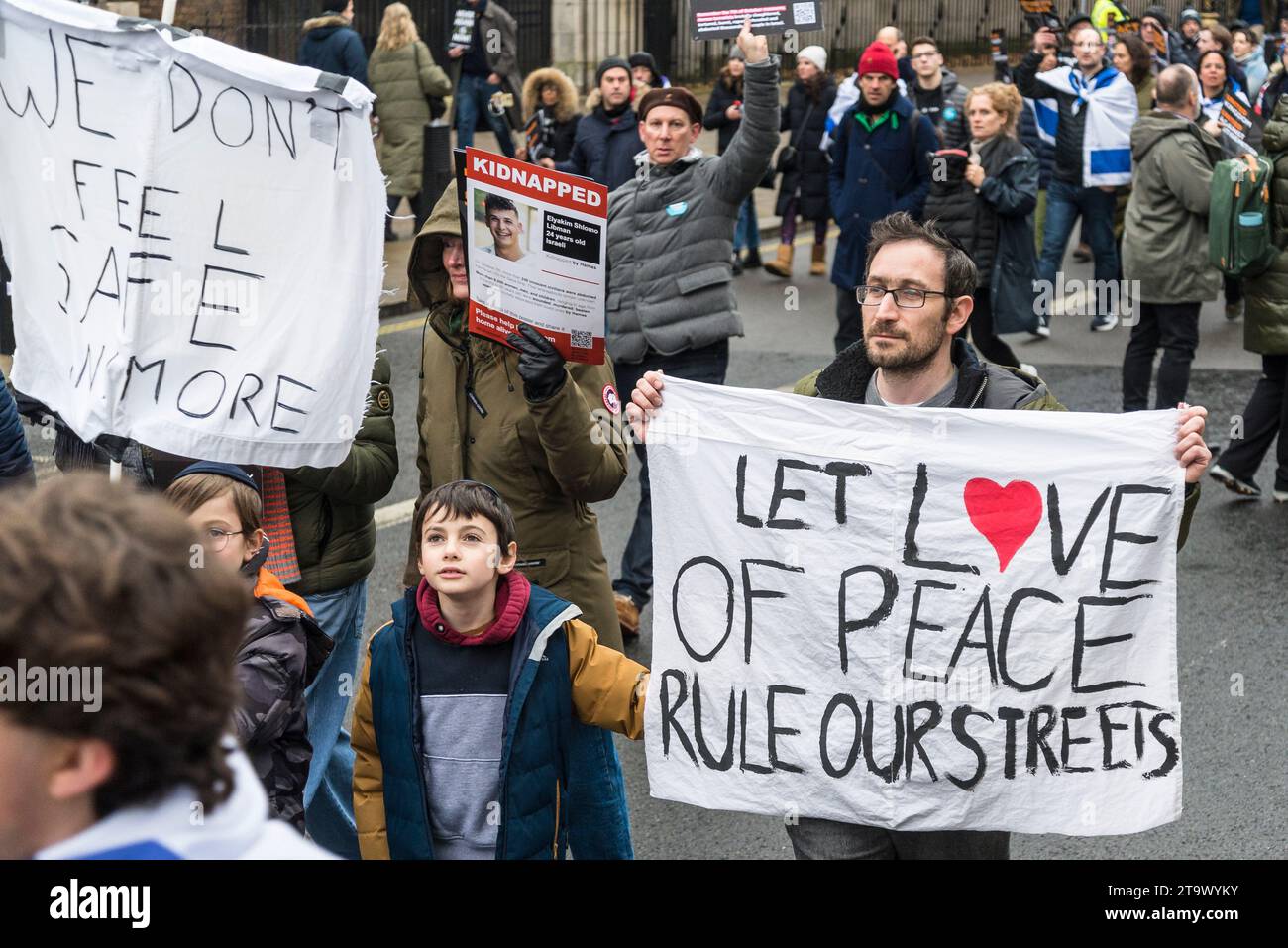 Let Love of Peace Rule Our Street, March against antisemitism, tens of thousands people protest against a rise in hate crimes against Jews, London, UK Stock Photo