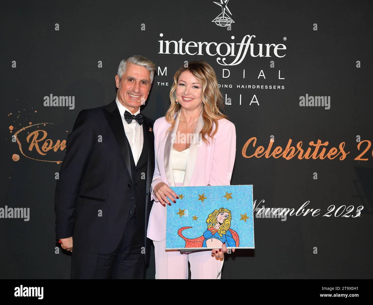 Rome, Italy. 26th Nov, 2023. Rome: Palazzo Torlonia. Roman Glamor Award for Celebrities 2023. In the photo: Gerry Santoro and Angela Melillo Credit: Independent Photo Agency/Alamy Live News Stock Photo