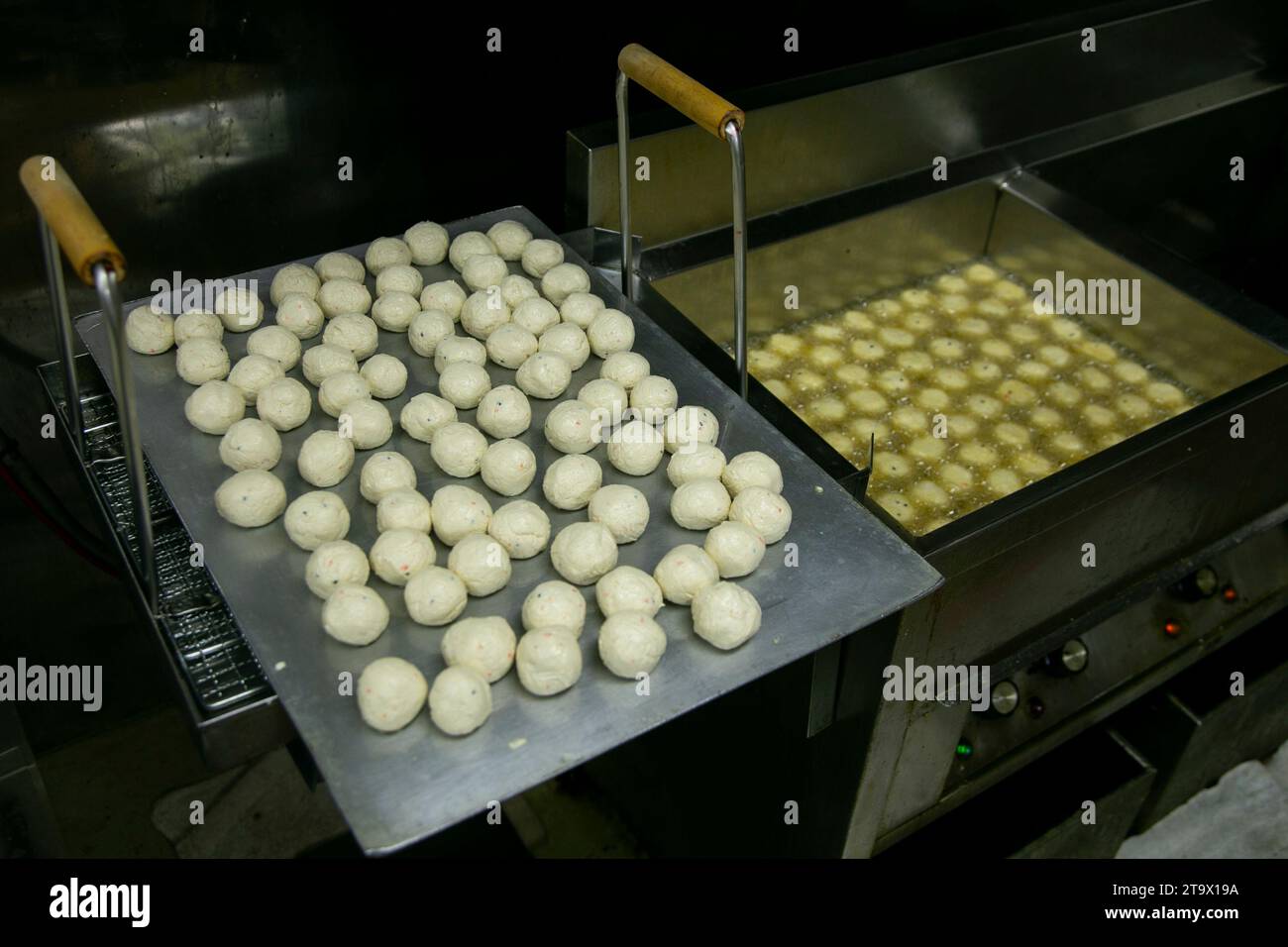 Preparing deep fried tofu balls at a Tofu Shop in Shizuoka, Japan Stock