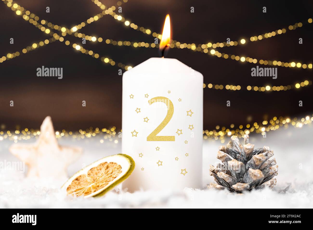 Bavaria, Germany - November 17, 2023: A candle burns for the 2nd Advent. Advent candle for the second Advent FOTOMONTAGE *** Eine Kerze brennt zum 2. Advent. Adventskerze zum zweiten Advent FOTOMONTAGE Credit: Imago/Alamy Live News Stock Photo