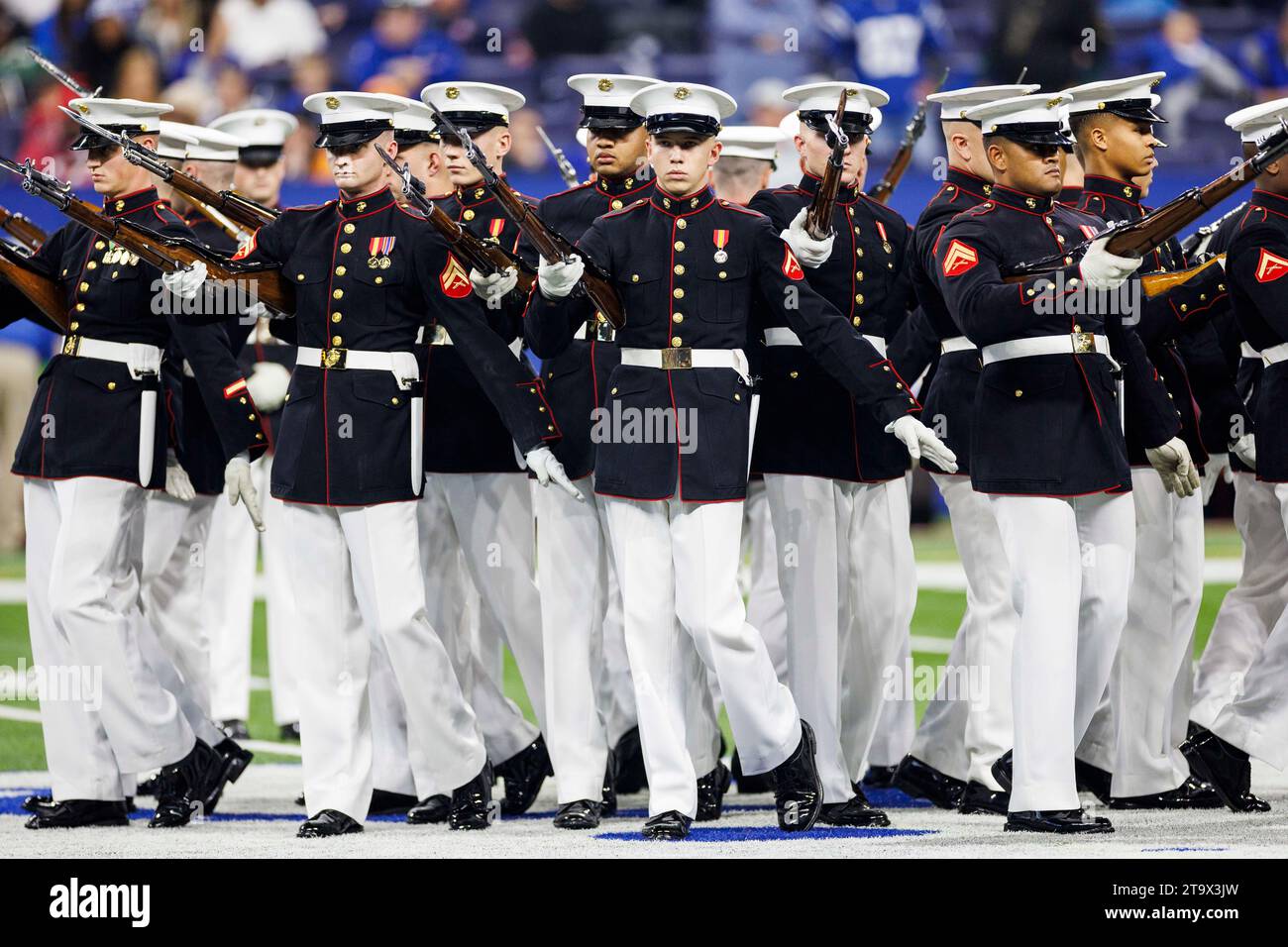 Indianapolis, Indiana, USA. 26th Nov, 2023. United States Marine Corps Silent Drill Platoon perform during halftime of NFL football game between the Tampa Bay Buccaneers and the Indianapolis Colts at Lucas Oil Stadium in Indianapolis, Indiana. Indianapolis defeated Tampa Bay 27-20. John Mersits/CSM/Alamy Live News Stock Photo