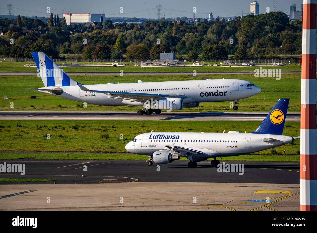 Düsseldorf Airport, NRW, Condor Airbus A330-200 on take-off, Lufthansa Airbus A310-100 on the taxiway, Stock Photo
