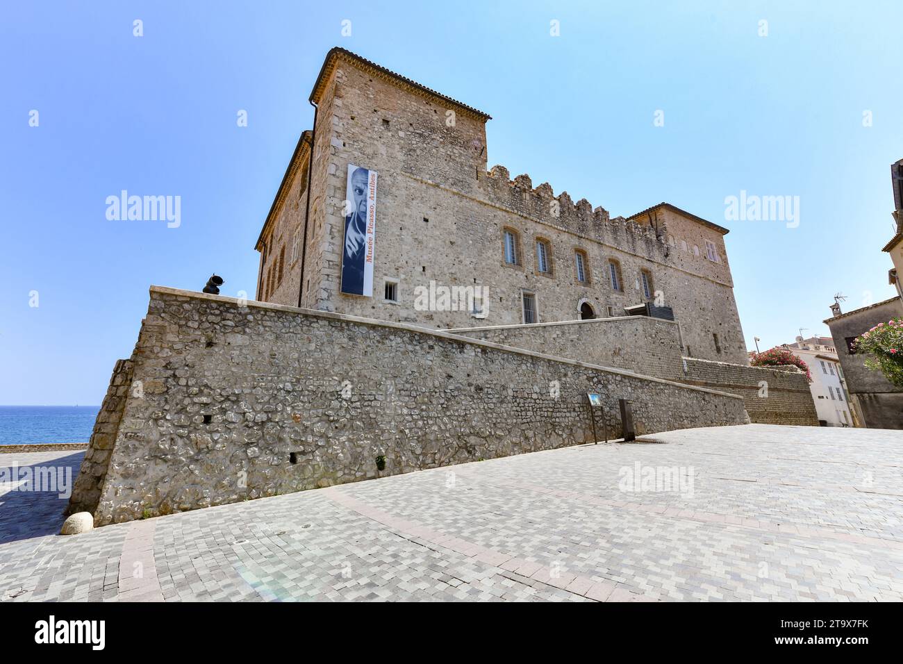 Jul 24, 2022: Antibes, France: Grimaldi Castle facade shown in Antibes, France. Grimaldi Castle shelter the Picasso Museum, where are exposed painting Stock Photo