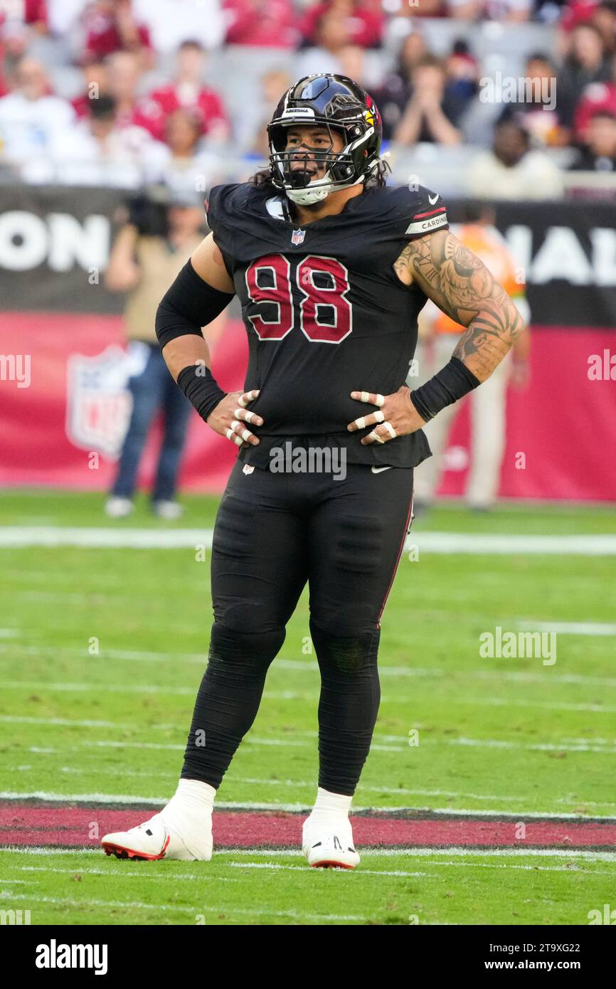 Los Angeles Rams defensive tackle Cory Durden (98) lines up against the Los  Angeles Rams during the first half of an NFL football game, Sunday, Nov.  26, 2023, in Glendale, Ariz. (AP