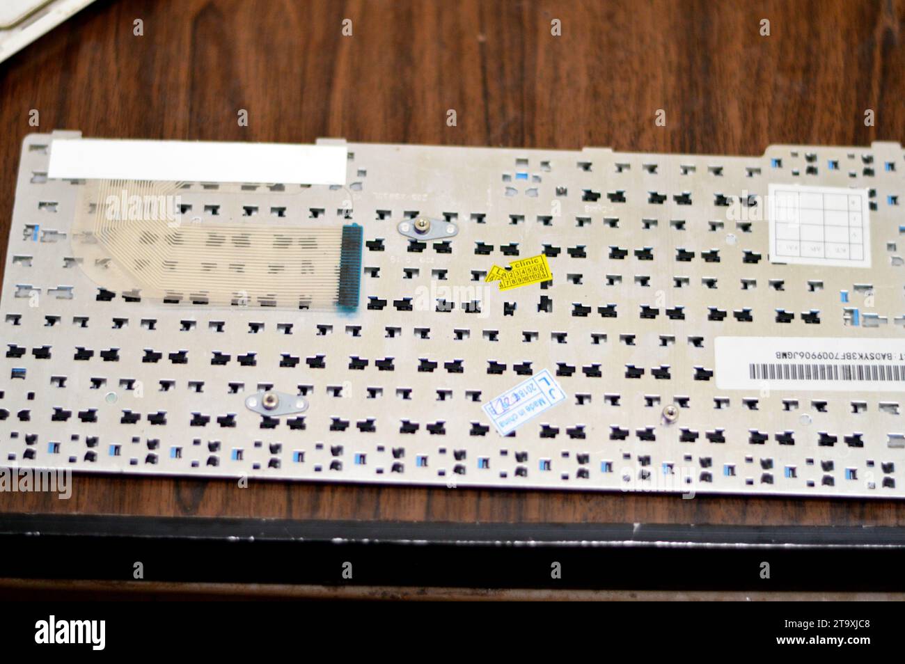 Cairo, Egypt, November 1 2023 Mini laptop keyboard maintenance, fixing