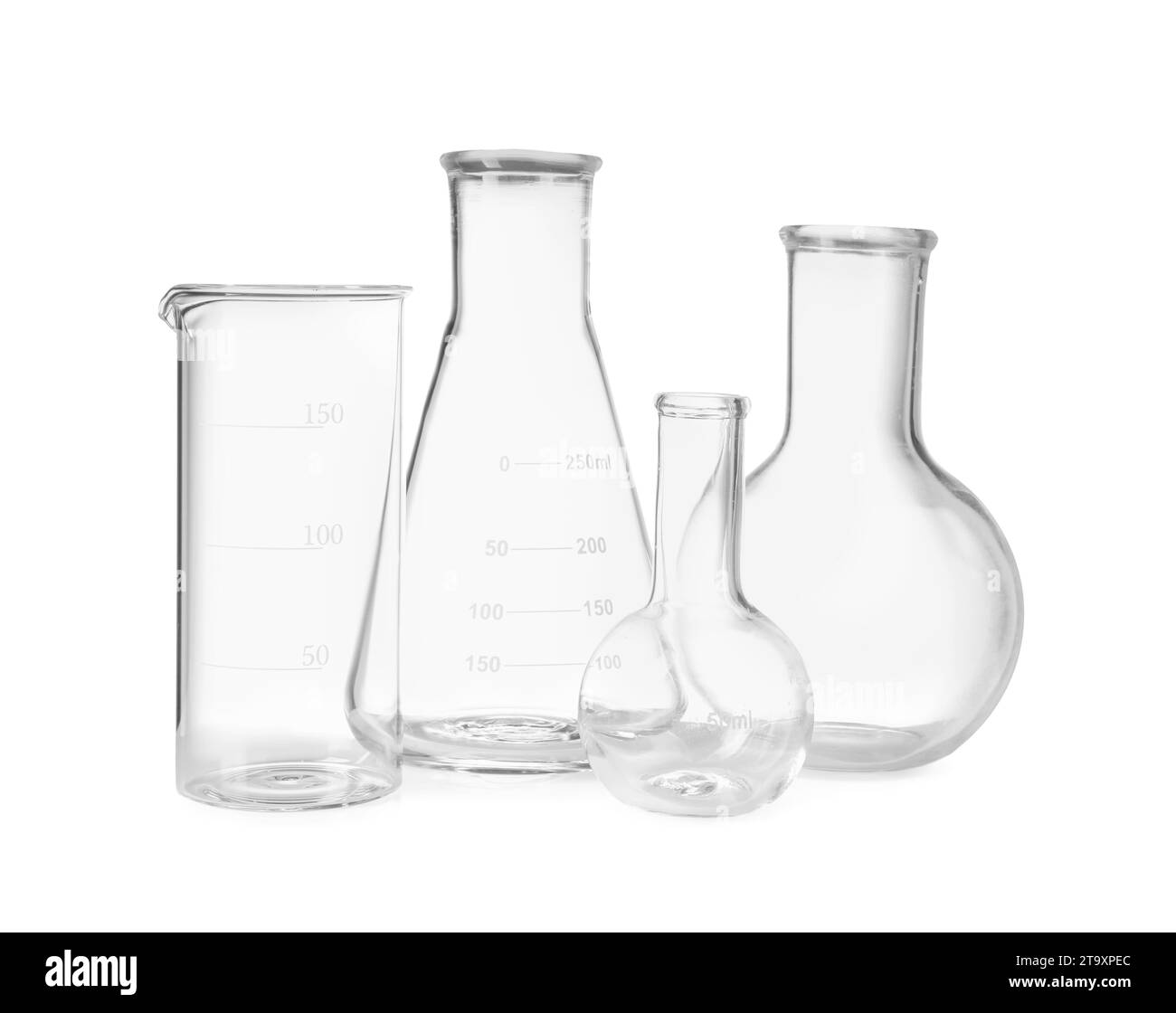 Many laboratory flasks and beaker isolated on white Stock Photo