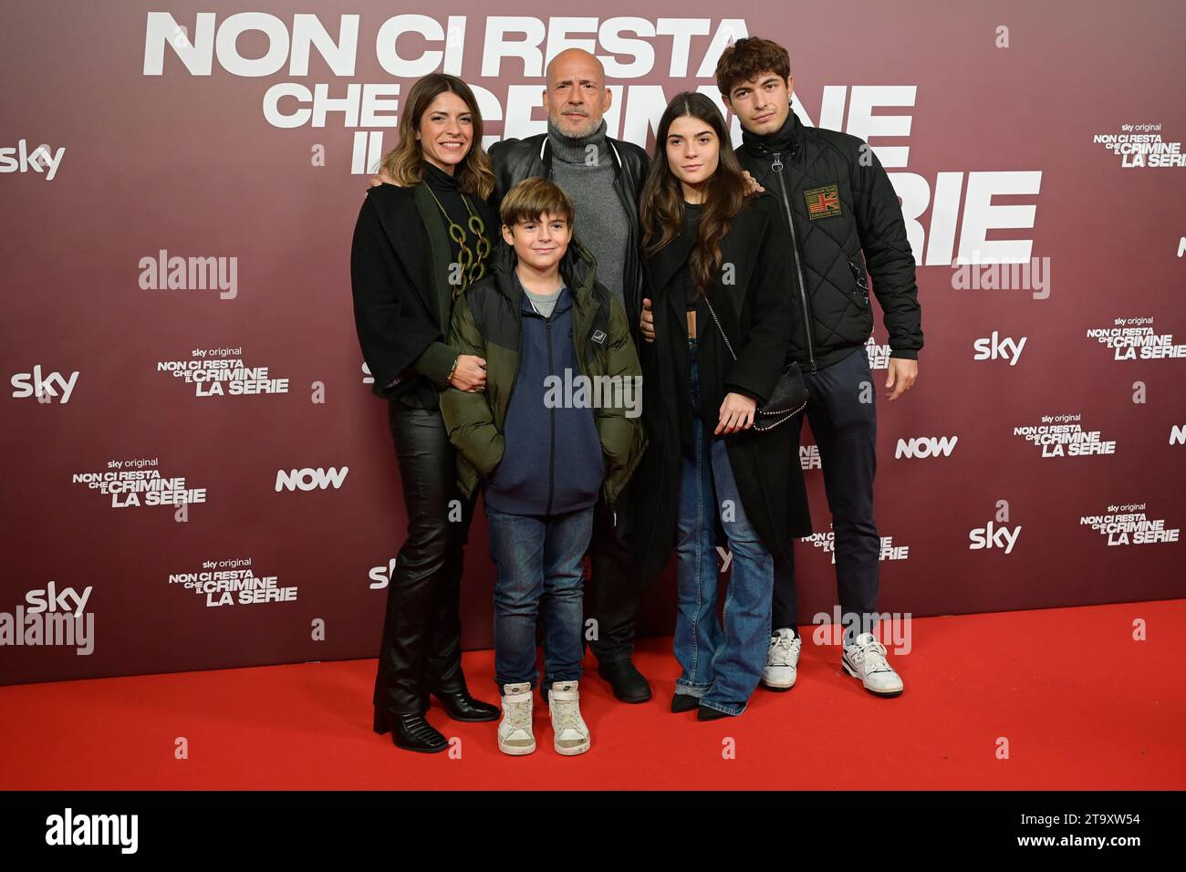 Rome, Italy. 27th Nov, 2023. Valeria Pintore (l), Gianmarco Tognazzi (r) and children (c) attend the red carpet of the Sky tv series Non ci resta che il crimine premiere at The Space Moderno Cinema. Credit: SOPA Images Limited/Alamy Live News Stock Photo