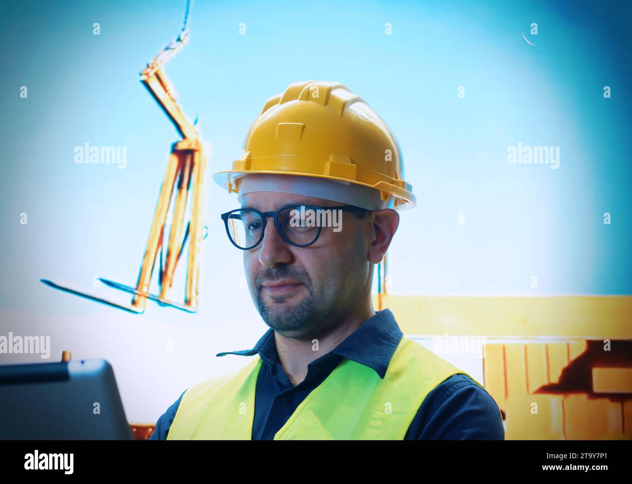 Engineer working with the tablet on a construction site . Stock Photo