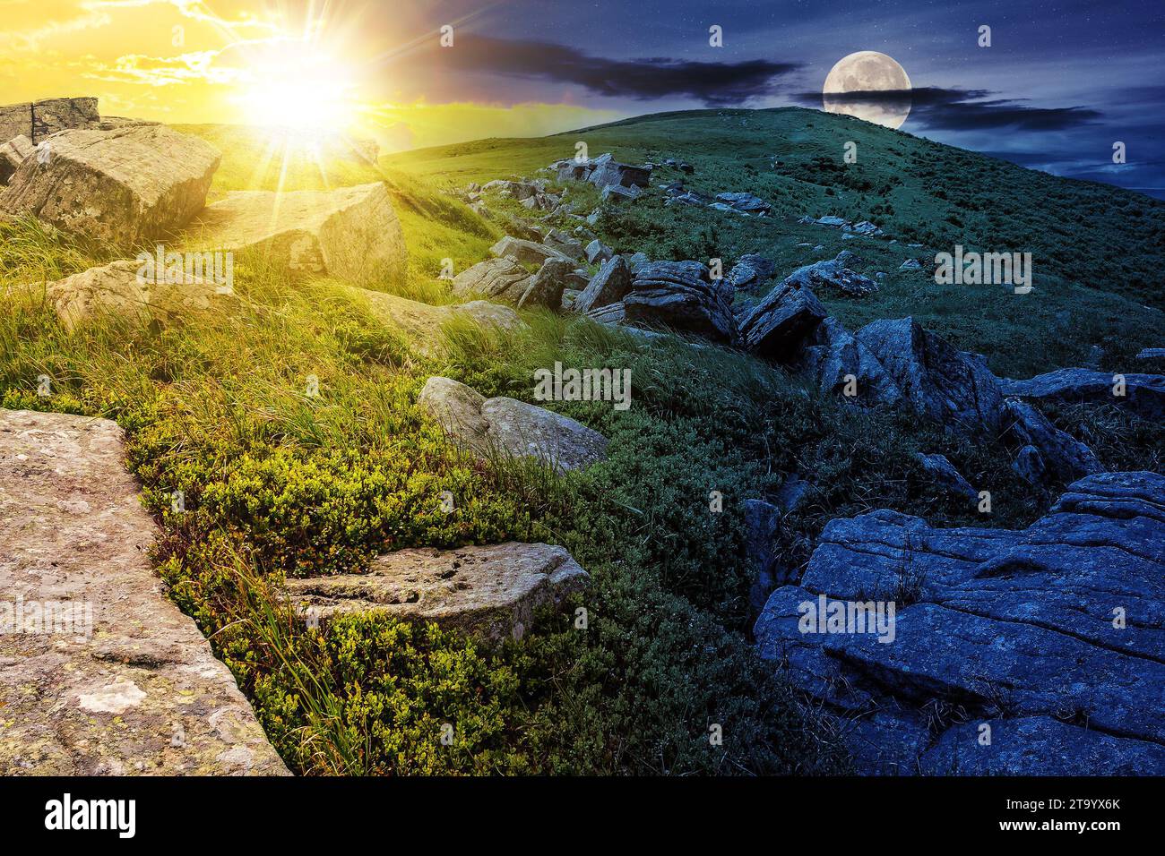 white stones and boulders on the hillside on top of Carpathian mountain range with sun and moon at twilight. day and night time change concept. myster Stock Photo