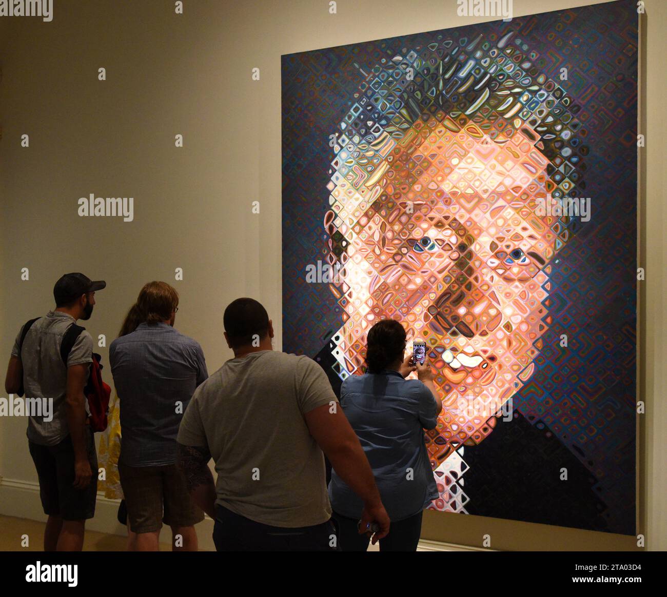 Washington, DC - June 02, 2018: People near the portrait of the 42nd president of the United States Bill Clinton by Chuck Close in National Portrait G Stock Photo