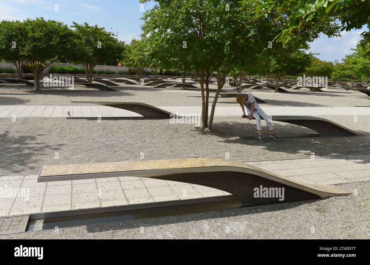 Washington, DC - June 01, 2018: People in the Pentagon Memorial dedicated to the victims of the September 11, 2001 attack. Stock Photo