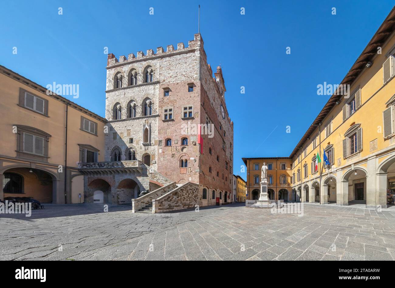 Piazza del Comune square with historic building of medieval Town Hall in Prato, Italy. Stock Photo