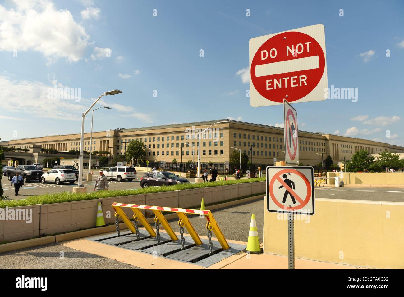 Washington, DC - June 01, 2018: Safety barriers and stop sign in front of Pentagon building, headquarters for the United States Department of Defense. Stock Photo