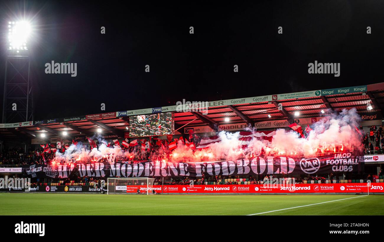Silkeborg, Denmark. 27th Nov, 2023. Football fans of Silkeborg IF seen on the stand during the 3F Superliga match between Silkeborg IF and FC Midtjylland at Jysk Park in Silkeborg. (Photo Credit: Gonzales Photo/Alamy Live News Stock Photo