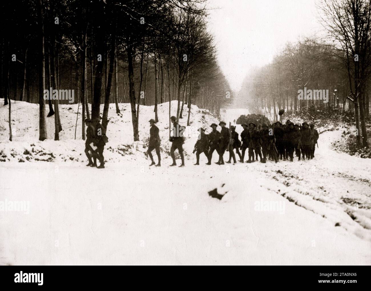 WW1 World War I - Troops marching through a wood in heavy snow Stock Photo
