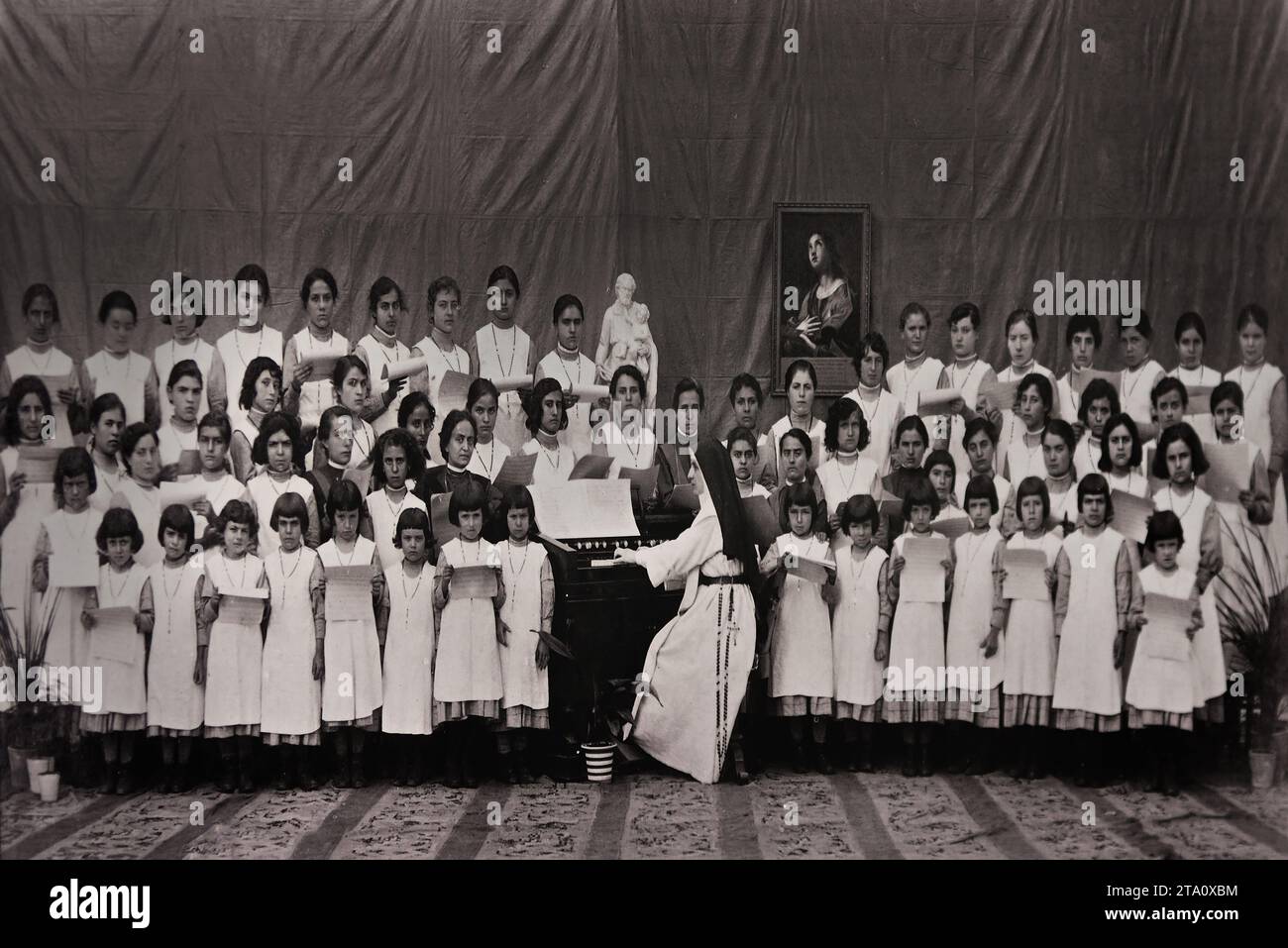 1917 Schola Cantorum with the orphan girls. Old Picture from the Orphanage for Children charity work has been done for orphans or support has been provided to orphans in some way. Cathedral of Pompeii - Sanctuary of Our Lady of the Rosary of Pompeii,   founded, 1876 - 1891, Italy, Italian, Stock Photo