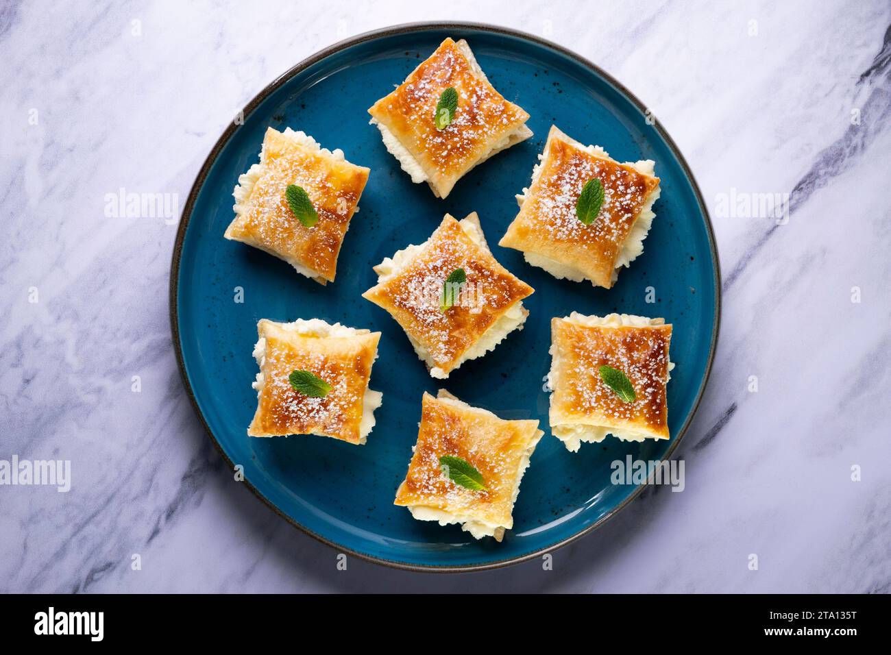 Miguelitos de la Rueda. Traditional Spanish dessert made with puff