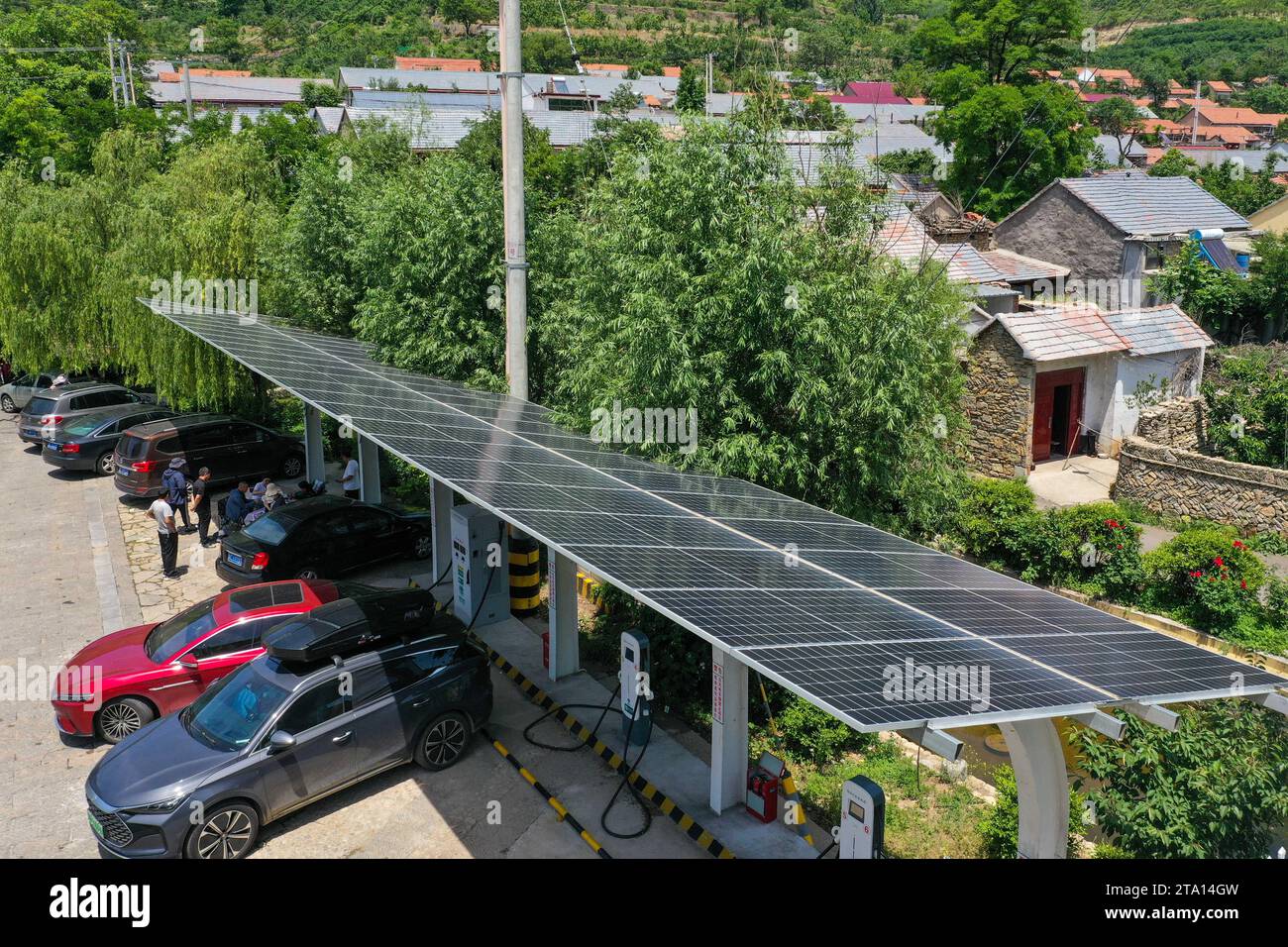 Guiyang. 31st May, 2023. This aerial photo taken on May 31, 2023 shows a photovoltaic energy storage charging station in Zhujiahu Village, Yanya Town in Yiyuan County, east China's Shandong Province. Credit: Zhu Zheng/Xinhua/Alamy Live News Stock Photo