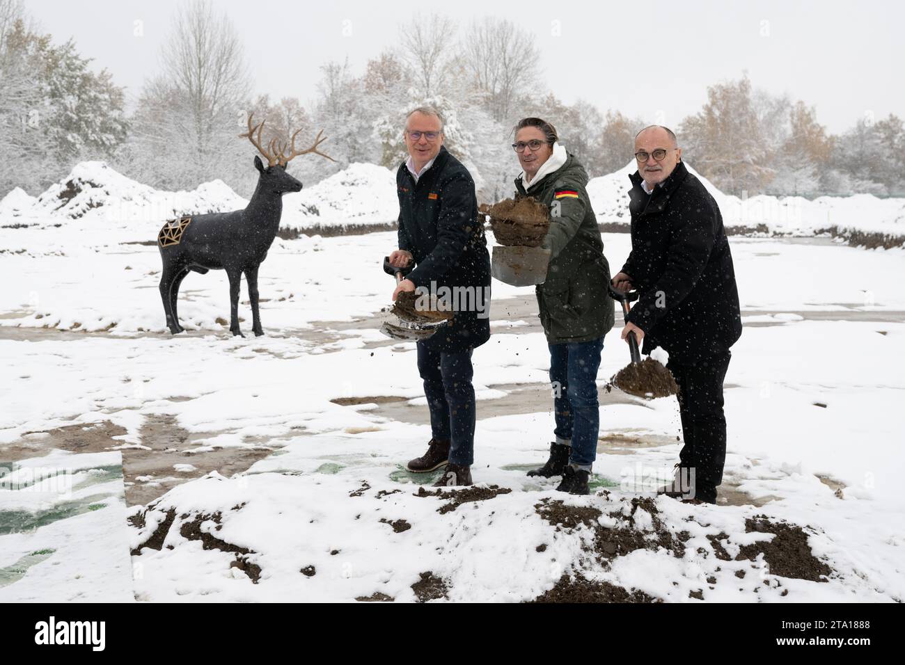 Kamenz, Germany. 28th Nov, 2023. Christopher Ratsch (l-r), CEO of  Mast-Jägermeister SE, Florian Rehm, majority shareholder, and Roland Dantz  (non-party), Mayor of Kamenz, stand together during a symbolic  ground-breaking ceremony at the