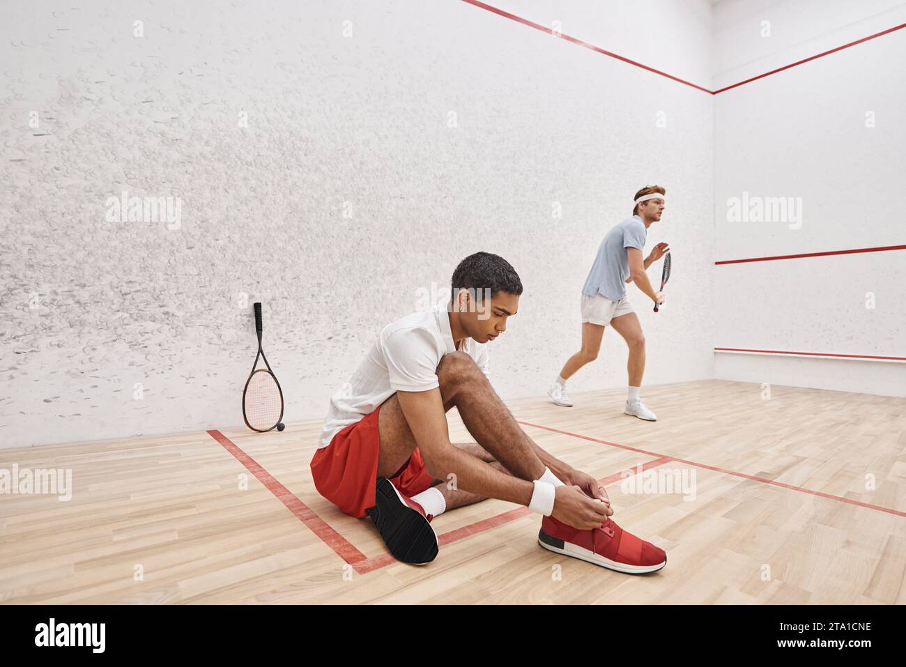 African american player tying hi-res stock photography and images - Alamy
