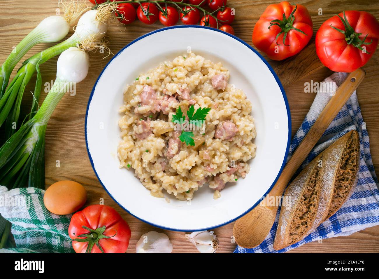 Catalan butifarra sausage risotto with parmesan. Mixed Spanish and Italian recipe. Stock Photo