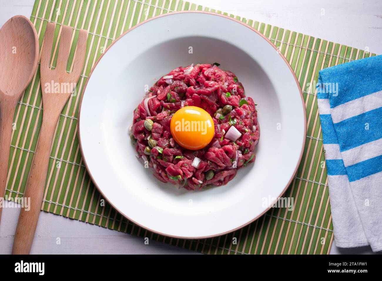 Traditional steak tartare with beef and egg yolk Stock Photo Alamy