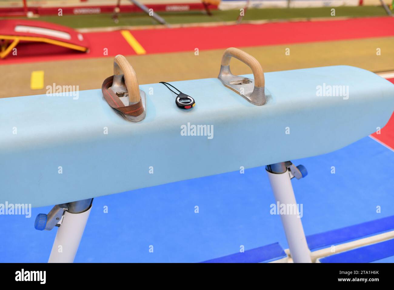 Pommel horse and stopwatch in the gym Gymnastic equipment Stock Photo Alamy