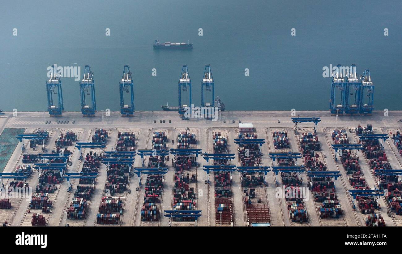 (231128) -- QINZHOU, Nov. 28, 2023 (Xinhua) -- This aerial photo taken on Nov. 24, 2023 shows the automatic container terminal at the Qinzhou Port in Qinzhou, south China's Guangxi Zhuang Autonomous Region. Started as a small fishing village in 1992, the Qinzhou Port of south China's Guangxi has been constructed into a modern international pivotal hub along the New International Land-Sea Trade Corridor after 30 years of development. An automated container terminal for sea-rail intermodal services has been constructed in Qinzhou Port, along with the industrial cluster thriving at the Qinzhou P Stock Photo