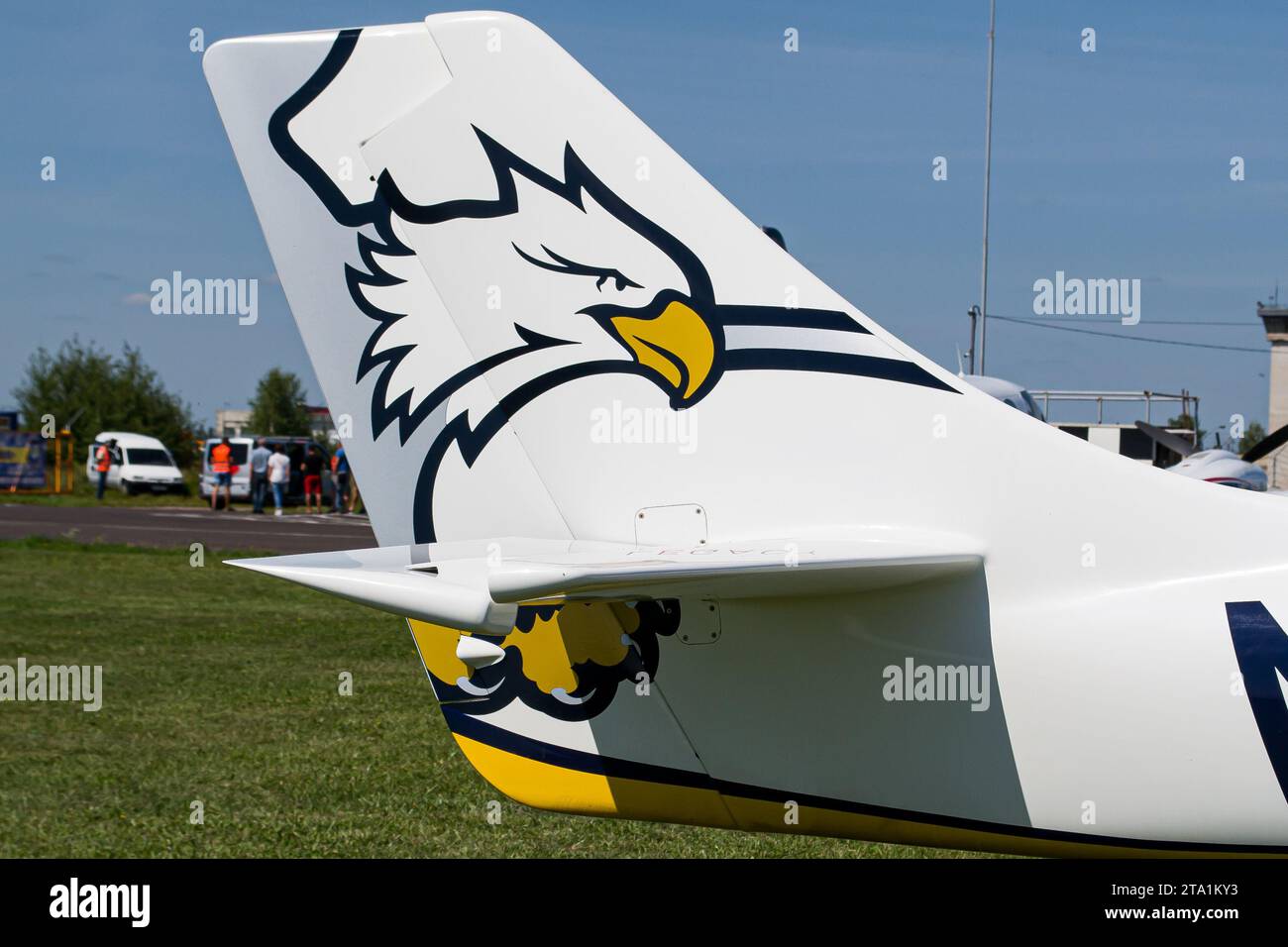 Private aircraft's vertical stabilizer and rudder with a beautiful eagle drawing on it Stock Photo