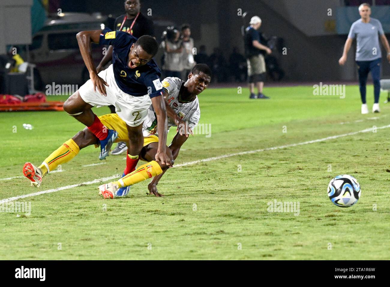 Surakarta, Indonesia. 28th Nov, 2023. Yvann Titi (L) of France competes during the semifinal match between France and Mali at FIFA U-17 World Cup Indonesia 2023 in Surakarta, Indonesia, Nov. 28, 2023. Credit: Agung Kuncahya B./Xinhua/Alamy Live News Stock Photo