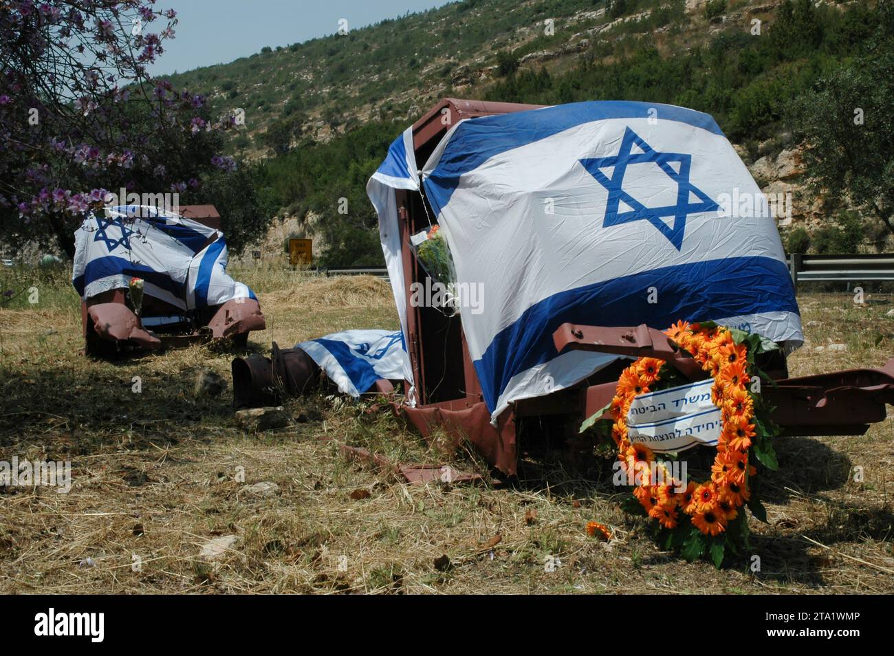 Flags cover the vehicles at the Sha'ar Hagai memorial to a convoy attacked along Highway 1 during Israel's War of Independence.  This historic photo p Stock Photo