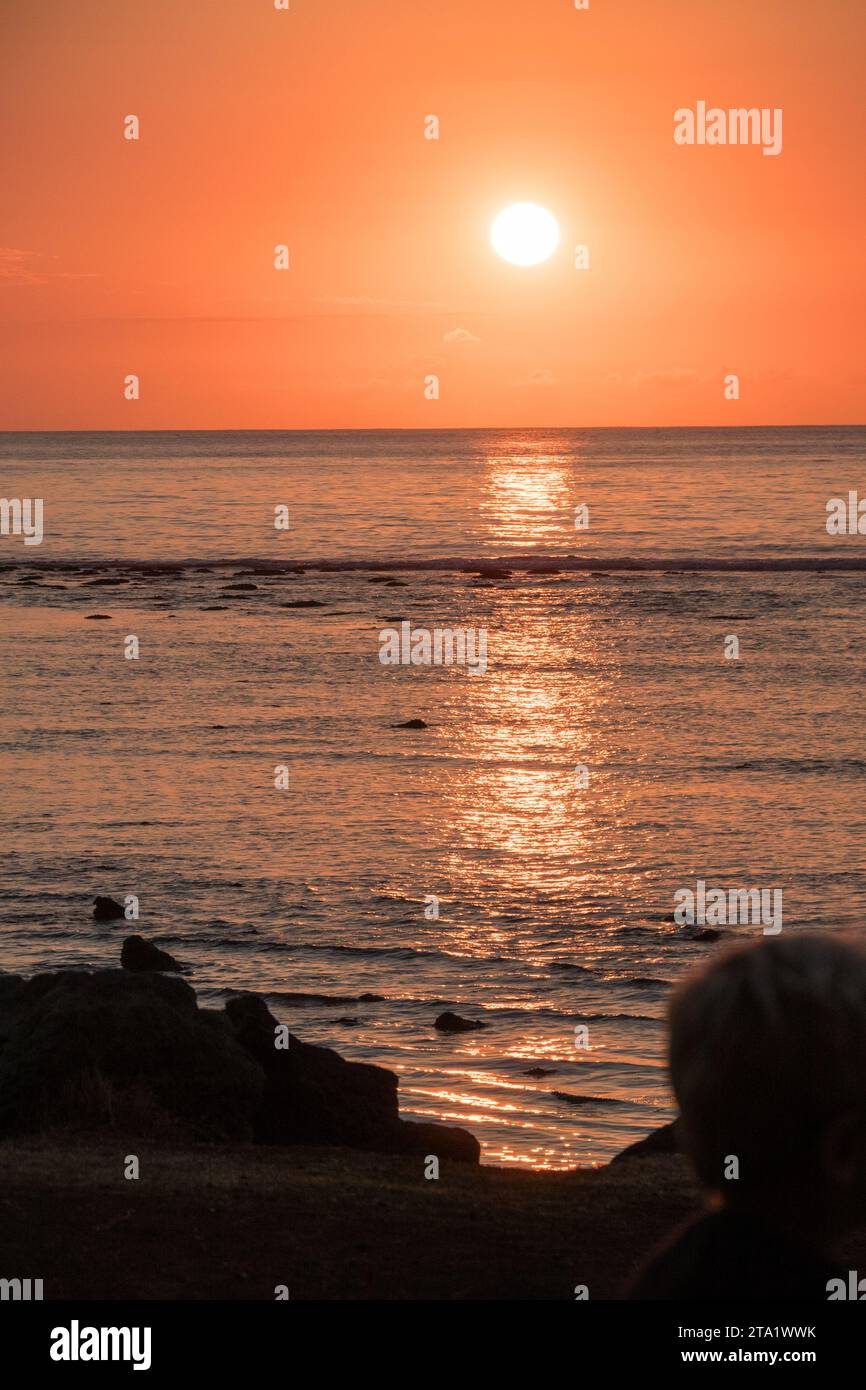 Orange sunset over the Indian Ocean, St-Leu, La Réunioin, France. Stock Photo